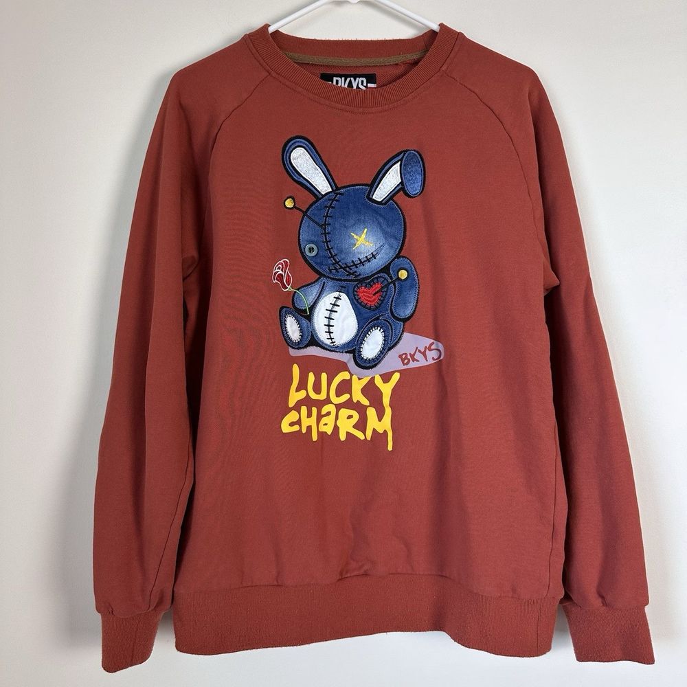 BKYS Sweater Womens Size Medium Orange Lucky Charm Sweatshirt Pullover